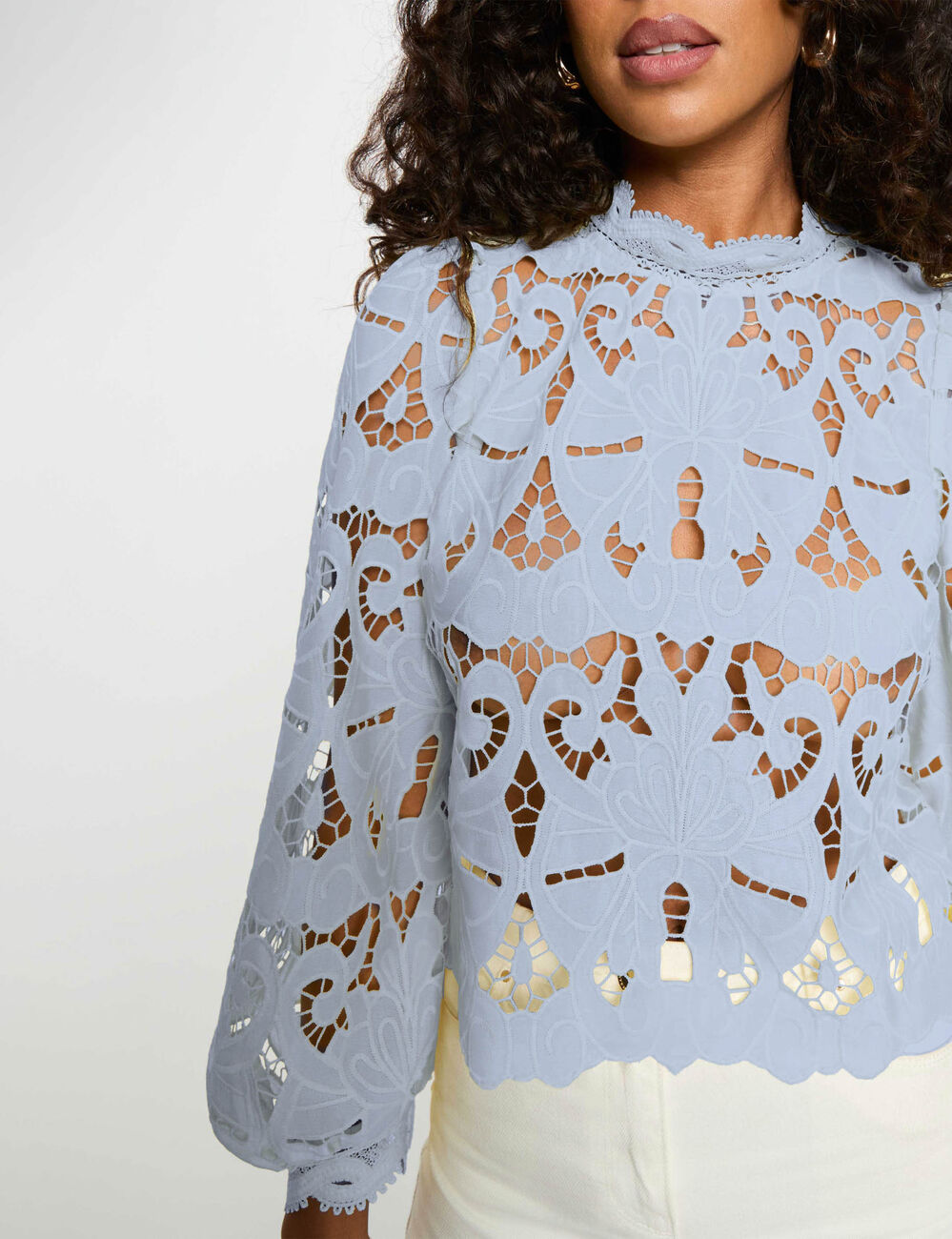 Embroidered blouse with high neck sky blue women