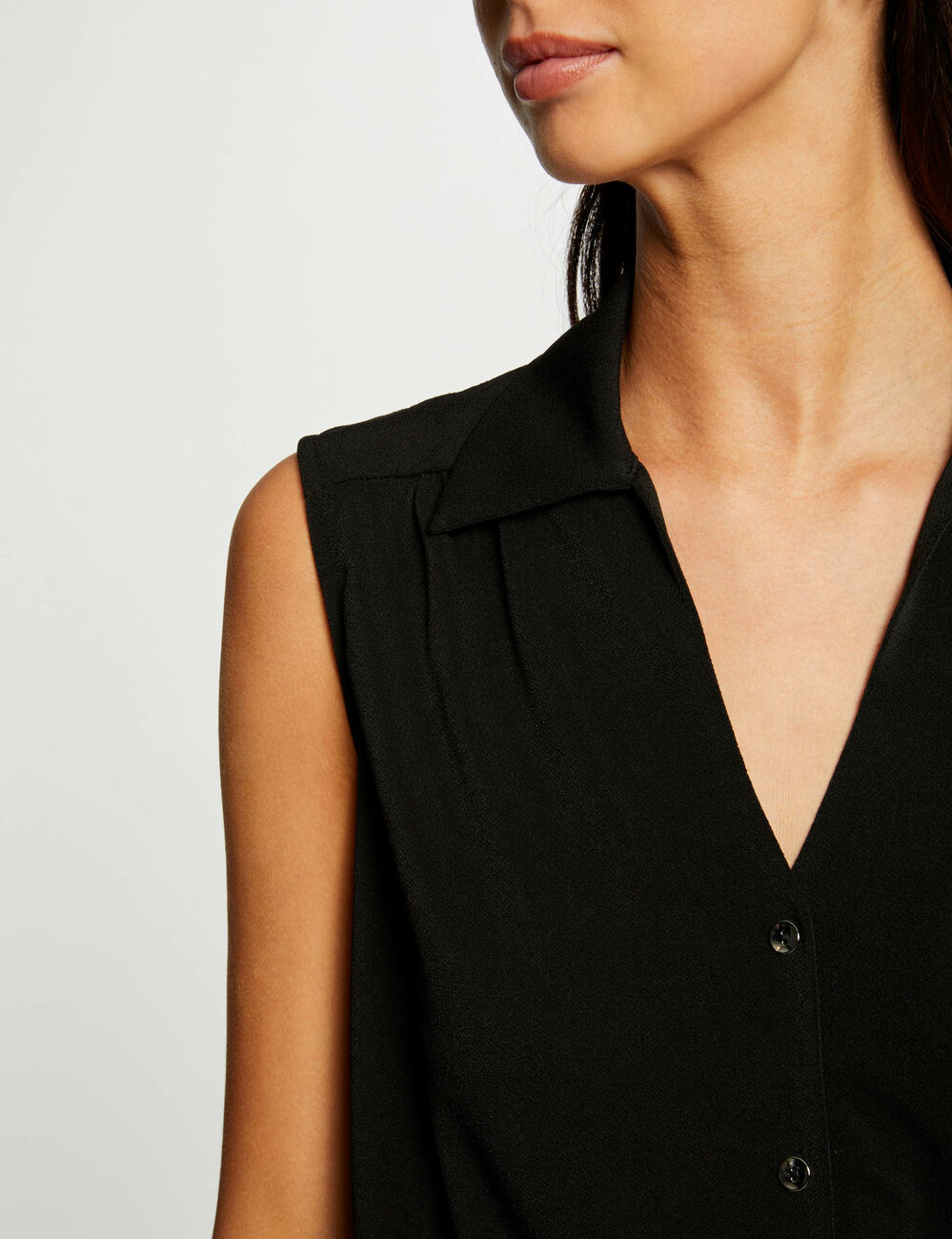 Sleeveless tied blouse black women