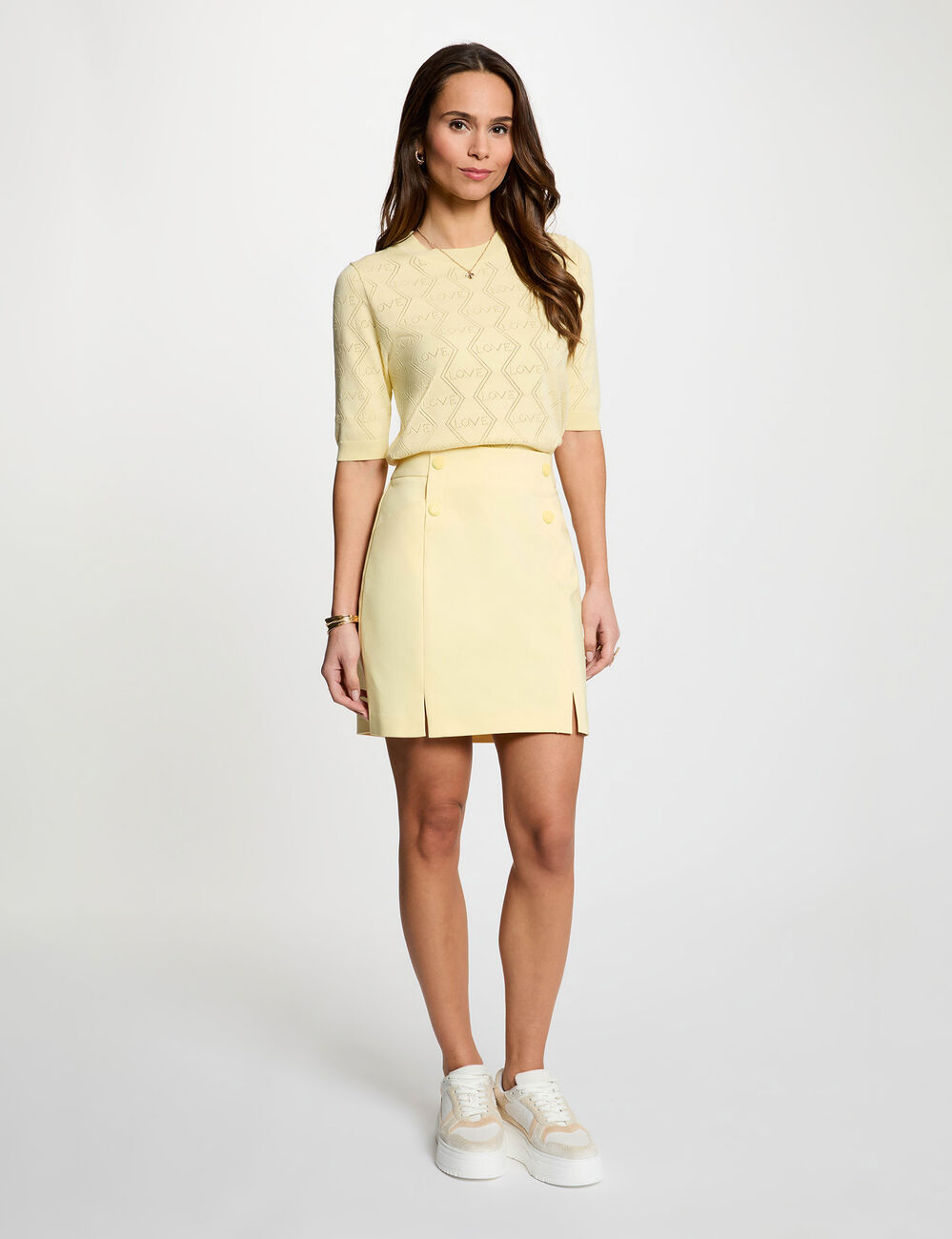 Mini skirt with buttons light yellow women