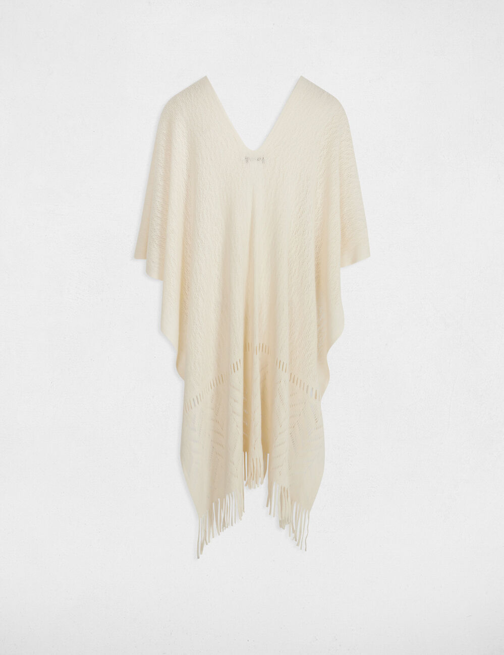 Knitted cape with fringes ivory women