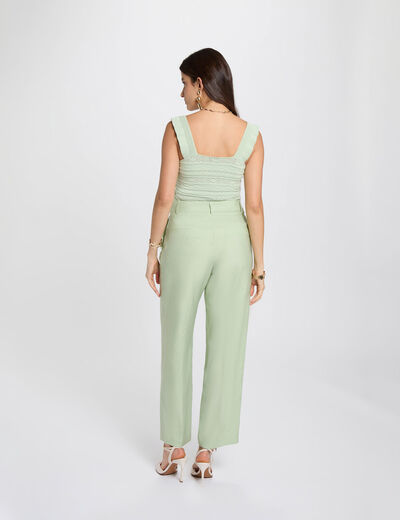 High-waisted carrot trousers pastel green women