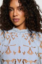 Embroidered blouse with high neck sky blue women