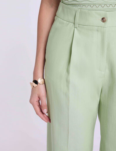 High-waisted carrot trousers pastel green women