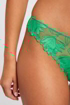 Tanga en dentelle vert femme