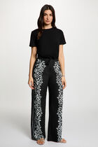 Flowy printed trousers black women
