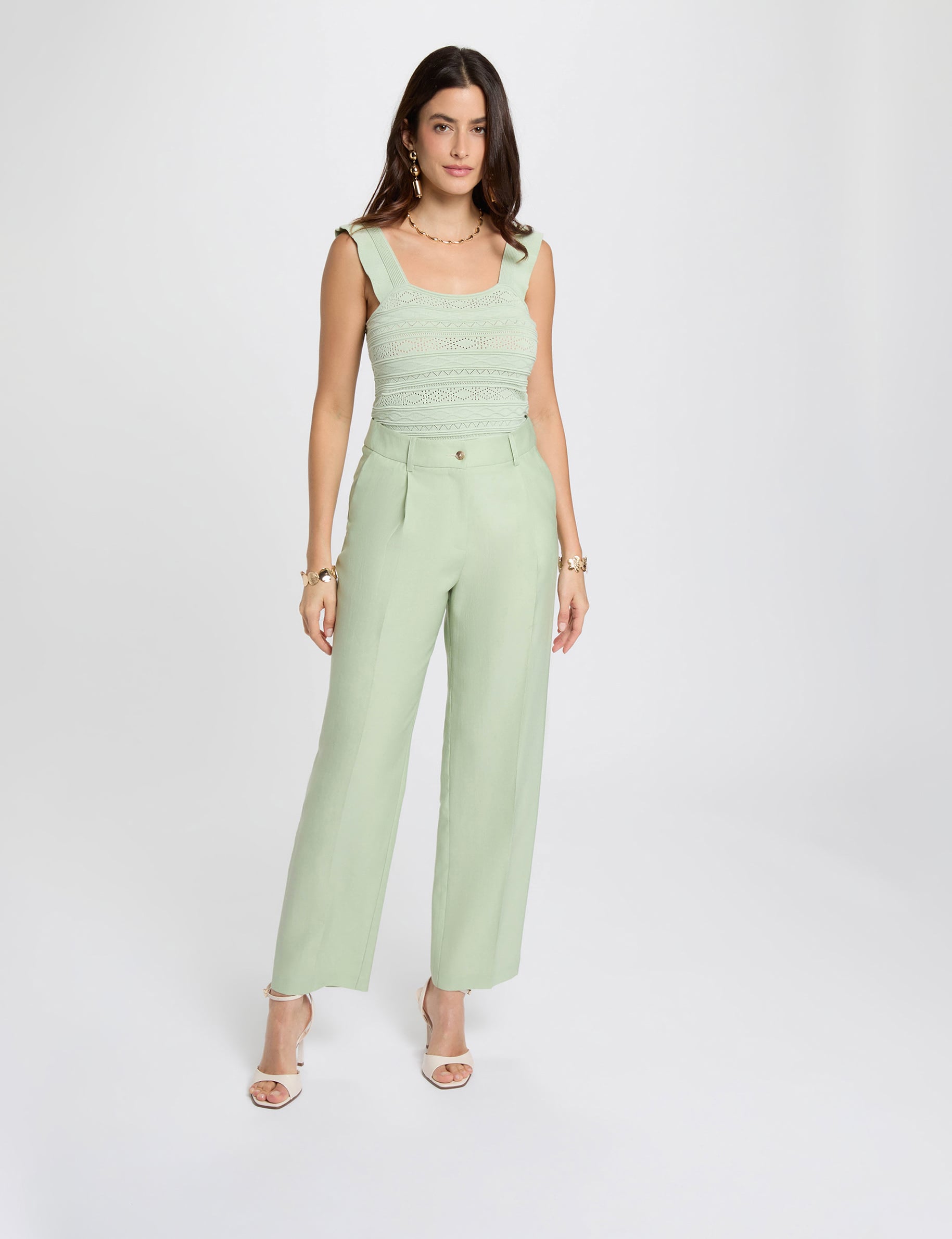 High-waisted carrot trousers pastel green women