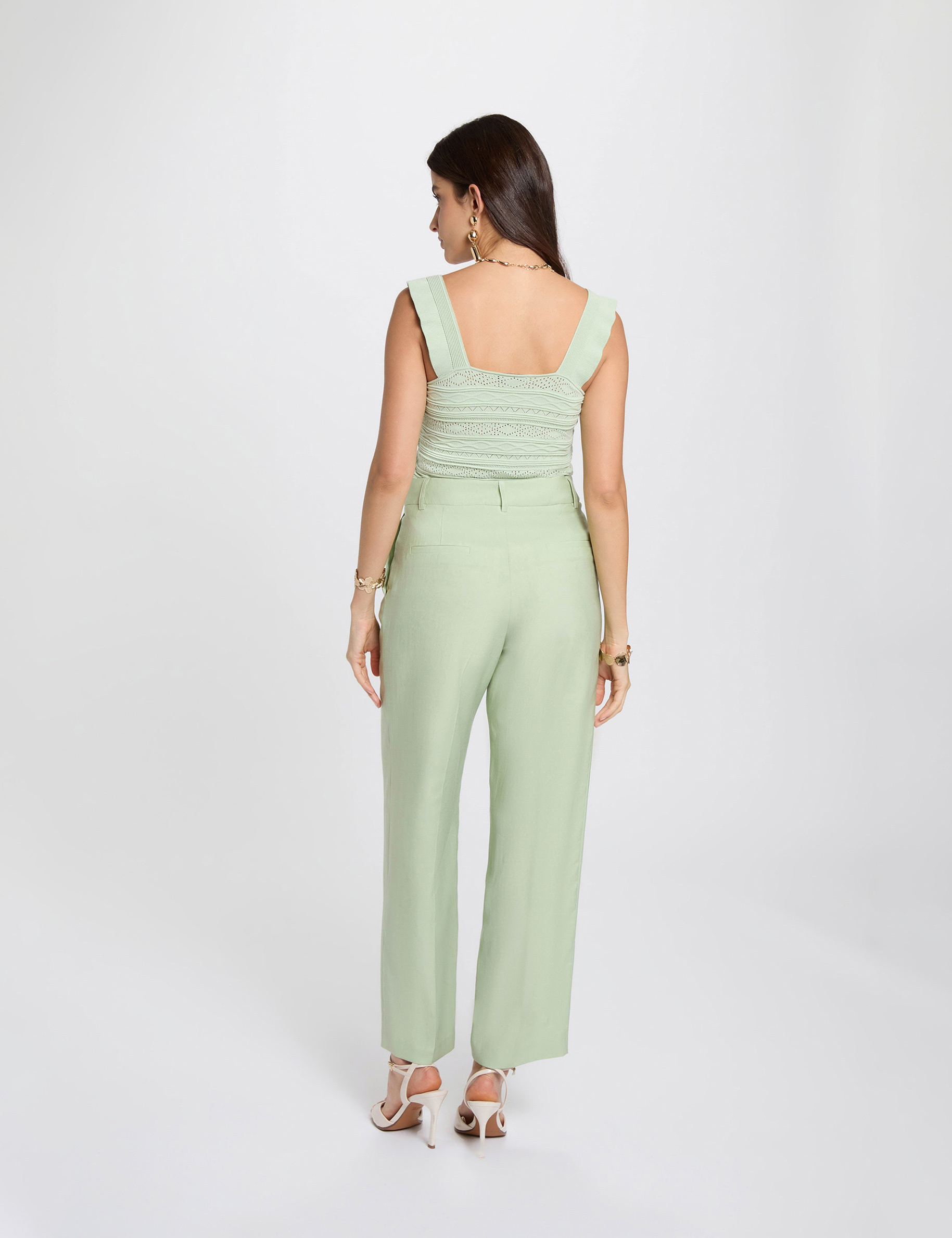 High-waisted carrot trousers pastel green women