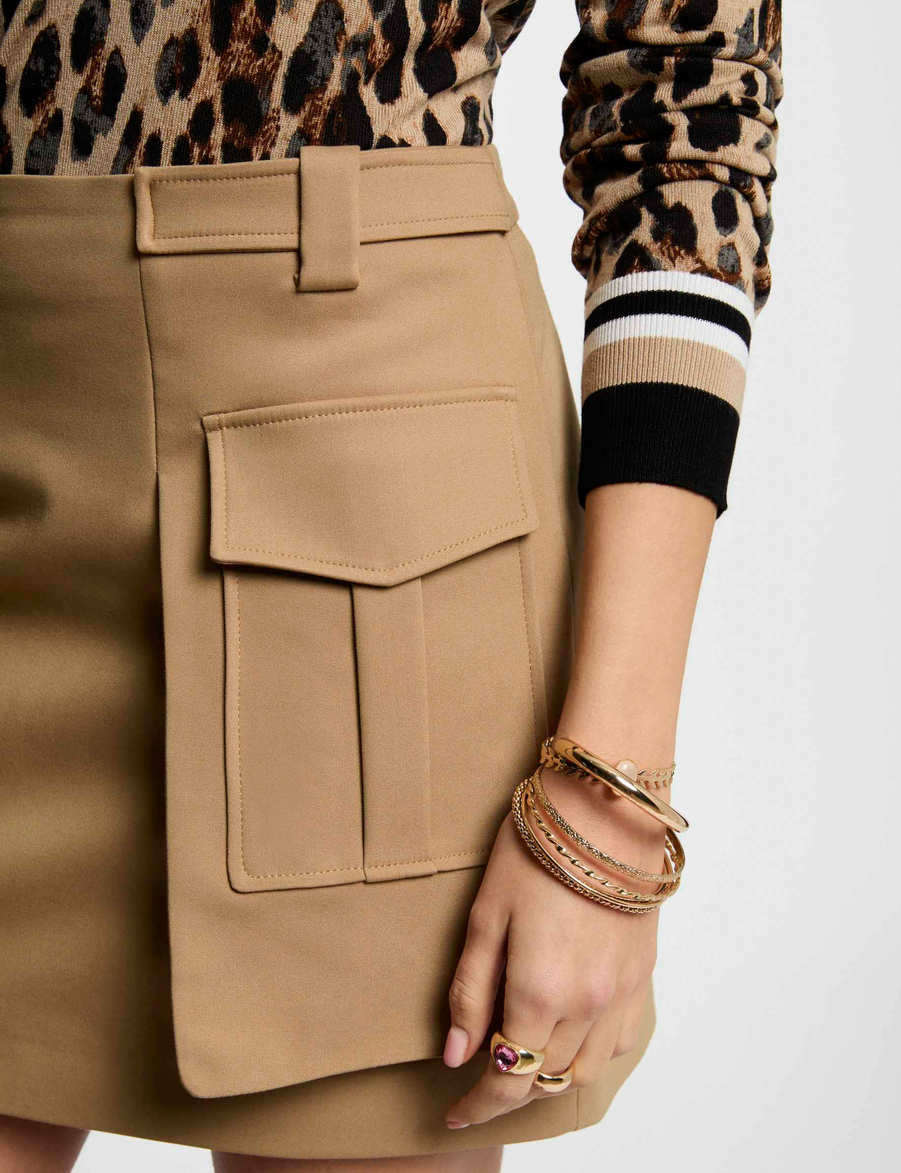 Mini skirt with side pockets beige women | Morgan